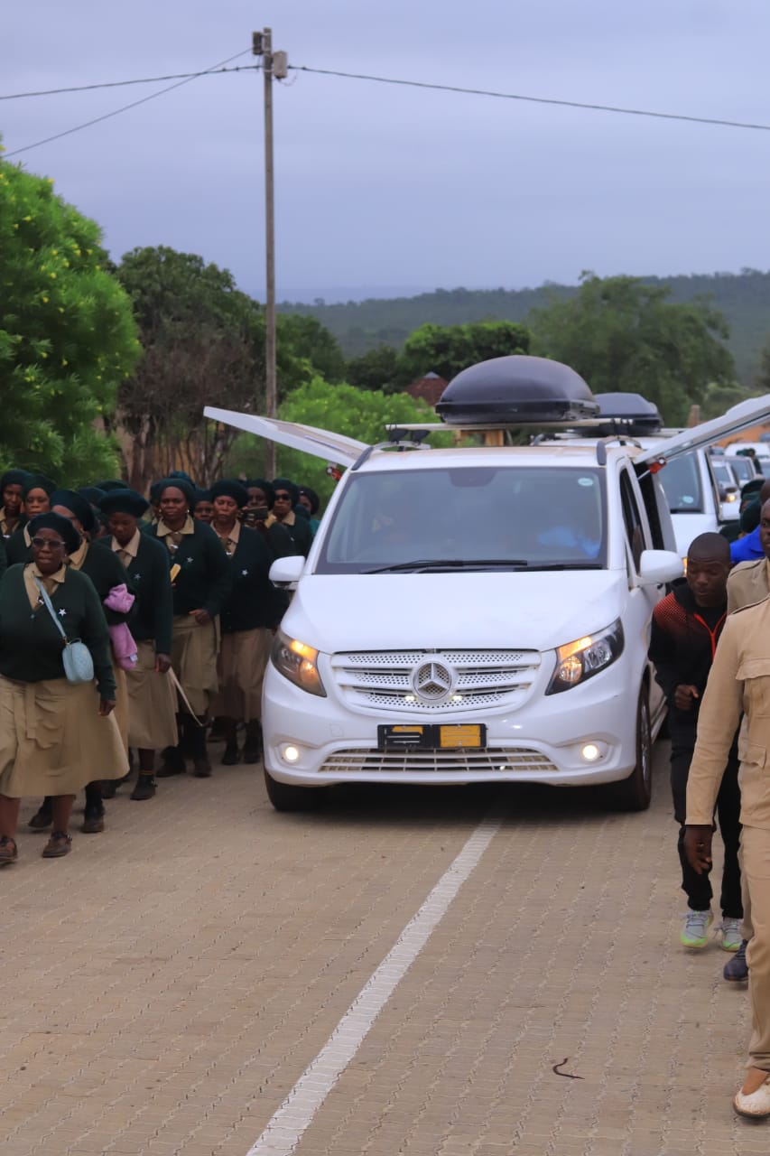 Hearse and service team during funeral coordination